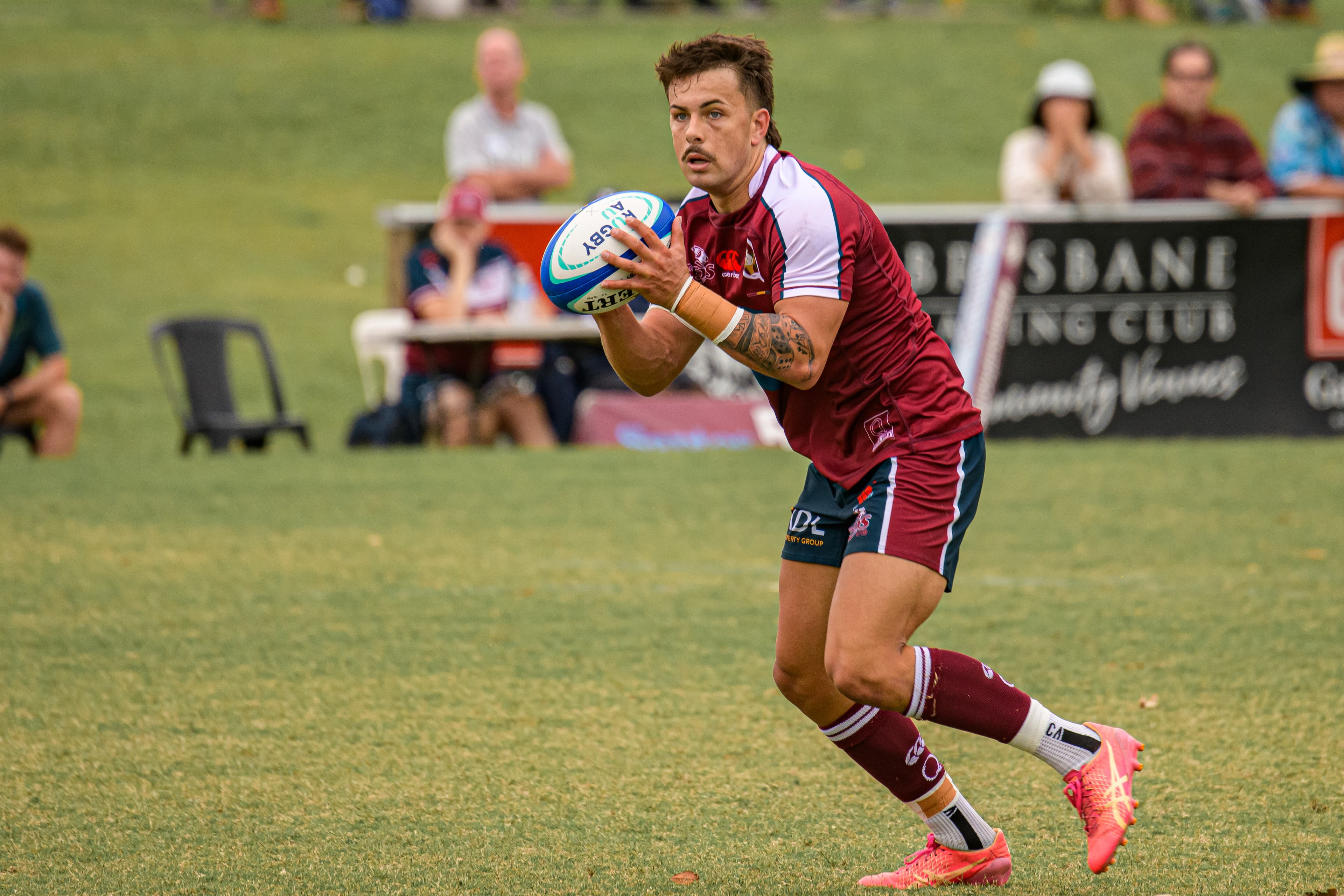 Reds U19s flyhalf Maddox Maclean sizes up the defence. Photo: James Auclair, Reds media