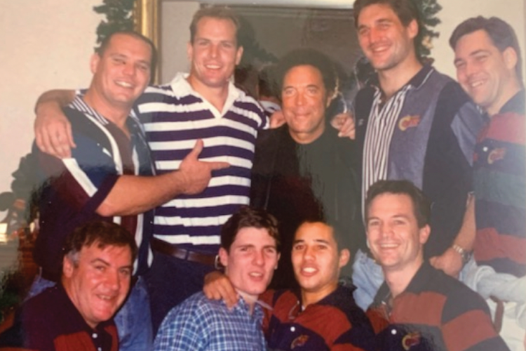 Tom Jones engulfed by members of the Queensland Reds in Newcastle on the development tour of the UK in late 1996.