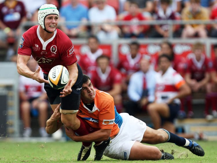 Berrick Barnes in action during his days with the Queensland Reds. Photo: Bradley Kanaris, Getty Images