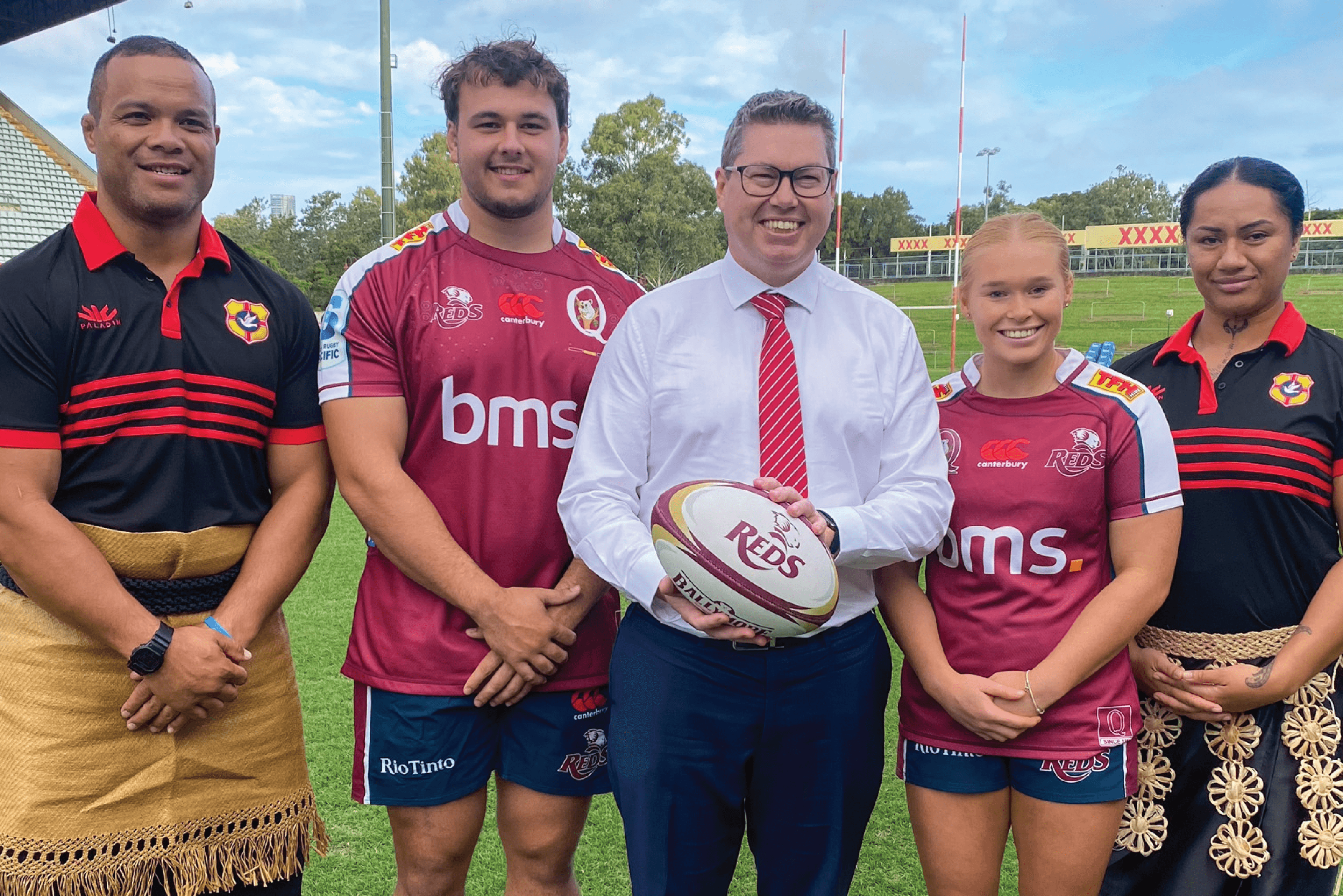 Minister for International Development and the Pacific, the Hon Pat Conroy MP, at Ballymore Stadium announcing the landmark rugby tour of Tonga for the Queensland Reds men's and women's teams with from (left) Tongan women's coach Eddie Aholehei, Reds prop Massimo De Lutiis, Reds halfback Nat Wright and Tongan women's prop Ayla Cook.