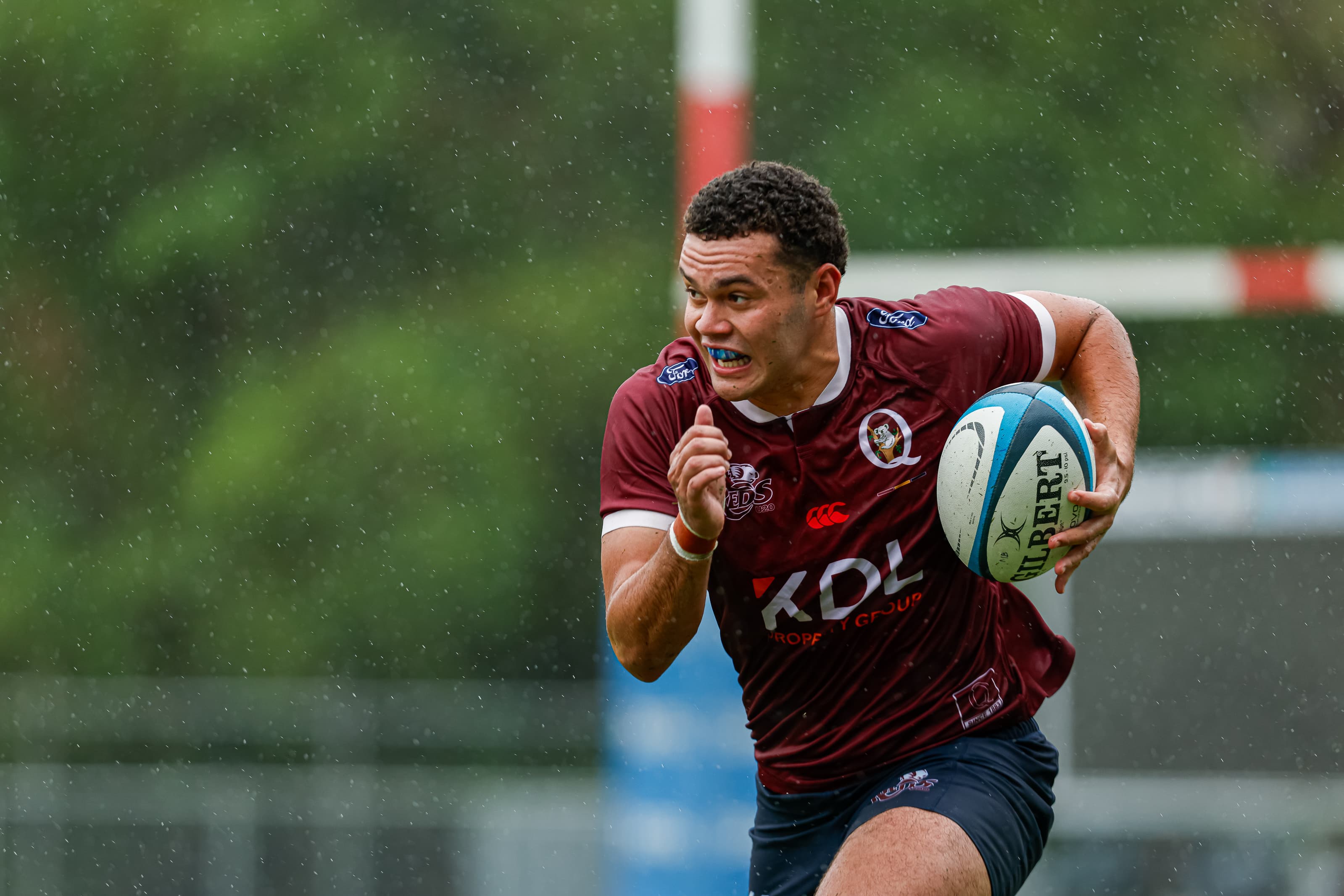 Reds Under-18s centre Taione Taka...enjoying the rivalry with NSW