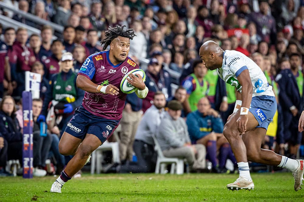 Brandon Paenga-Amosa takes on the Blues defence at Suncorp Stadium. Photo: Brendan Hertel/QRU