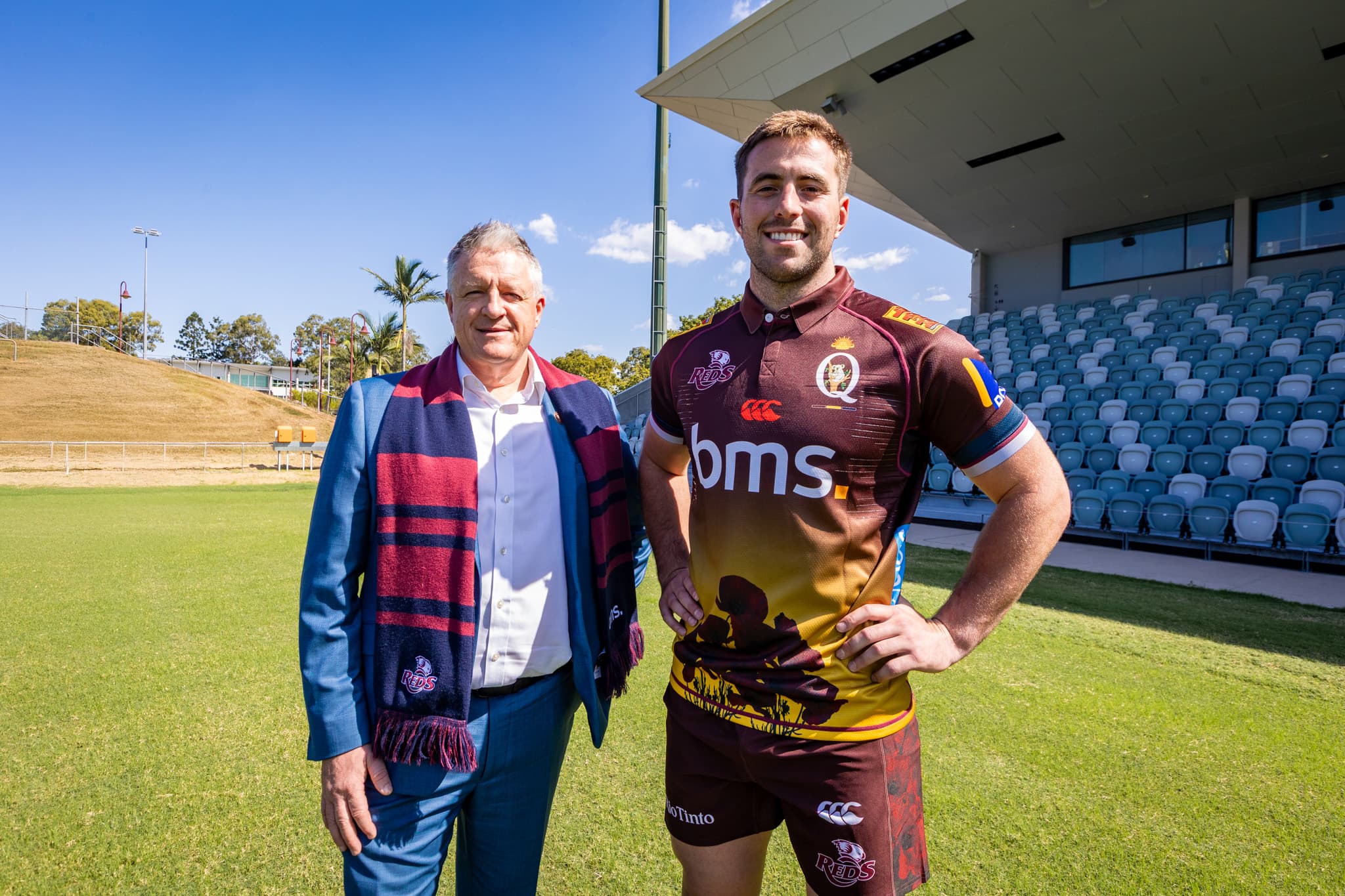 Flanker Joe Brial unveils the Reds' Anzac jersey with Gallipoli Medical Research Director Justin Greenwell