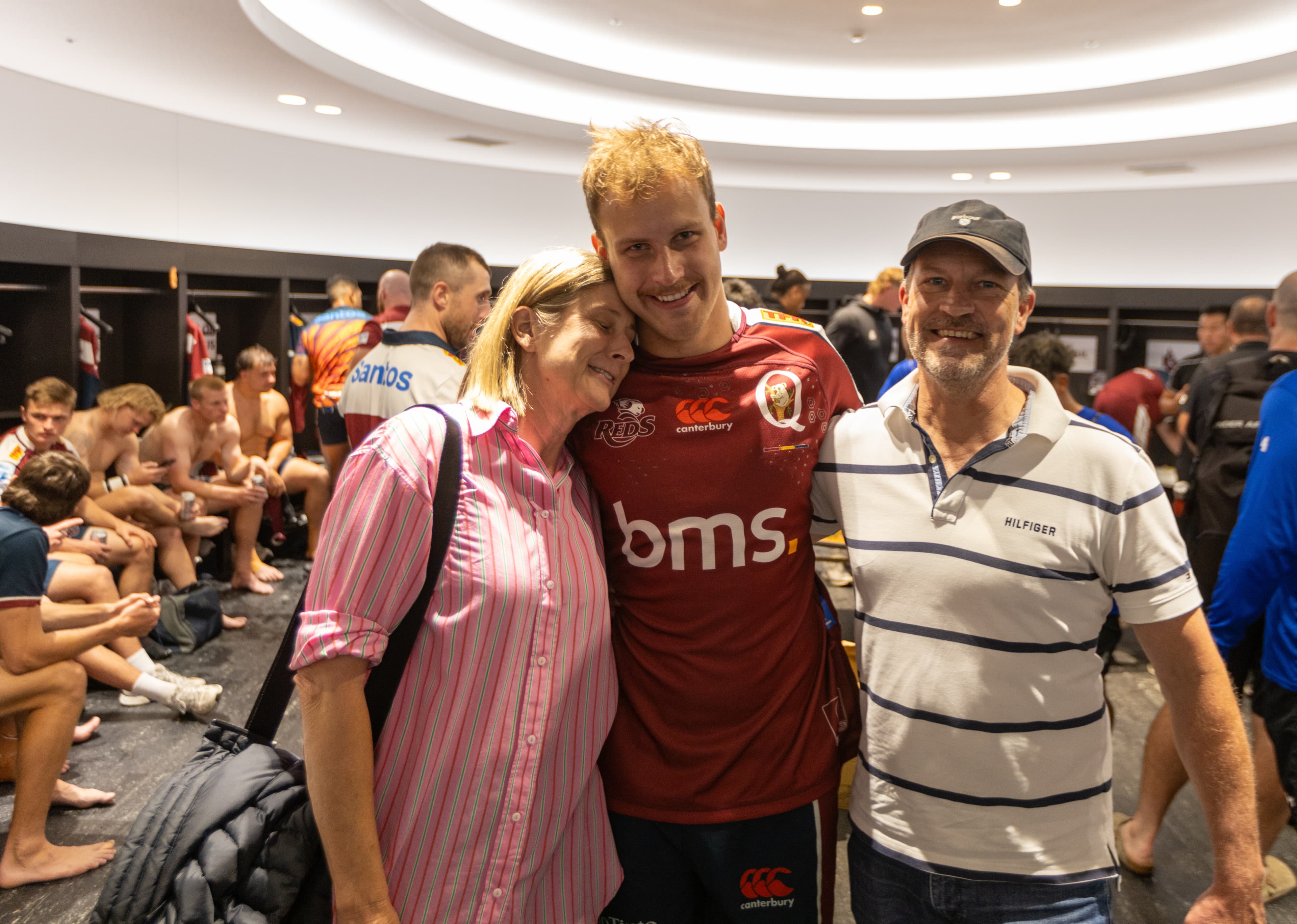 New Reds cap Hamish Muller...surprised by parents Lisa and Ross in Kumagaya