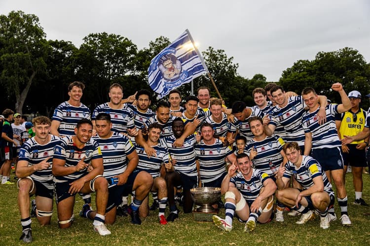 Will Cartwright (far right) and his Brothers teammates start celebrations after winning the 2024 Australian Club Championship.