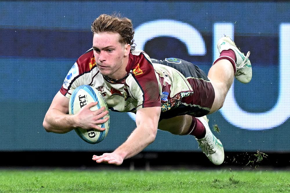 Tim Ryan of the Queensland Reds dives over to score a try during the round 14 Super Rugby Pacific match between Queensland Reds and Western Force at Suncorp Stadium