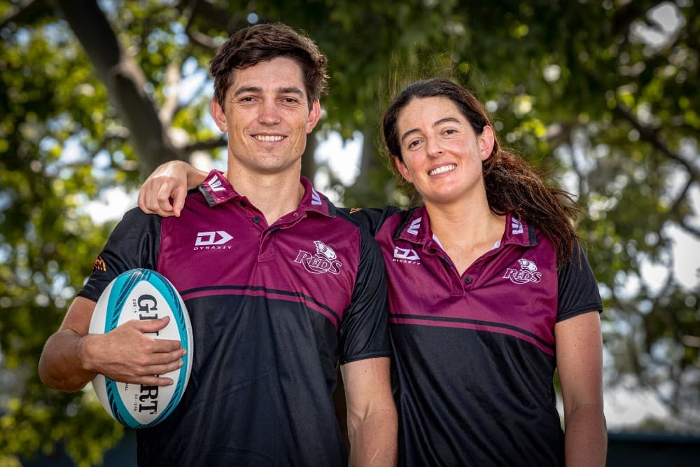 Jock and Tina Campbell making history with the Reds. Photo: Brendan Hertel/QRU