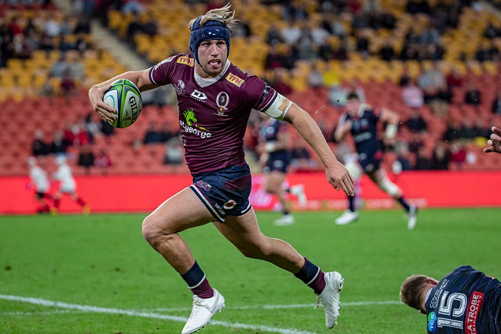 Hamish Stewart striding away to score for Queensland. Photo: QRU/Brendan Hertel