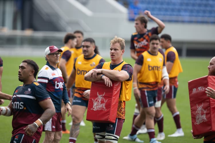 New Reds forward Hamish Muller (holding tackle shield)...a possible debut in Japan