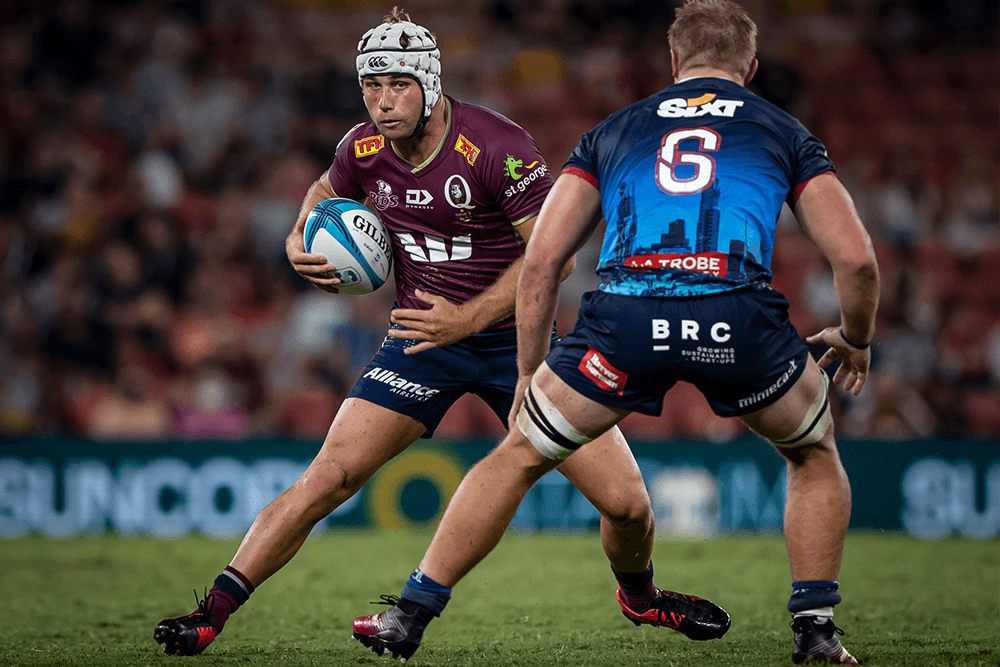 Hamish Stewart takes on the Rebels defence at Suncorp Stadium. Photo: QRU/Brendan Hertel