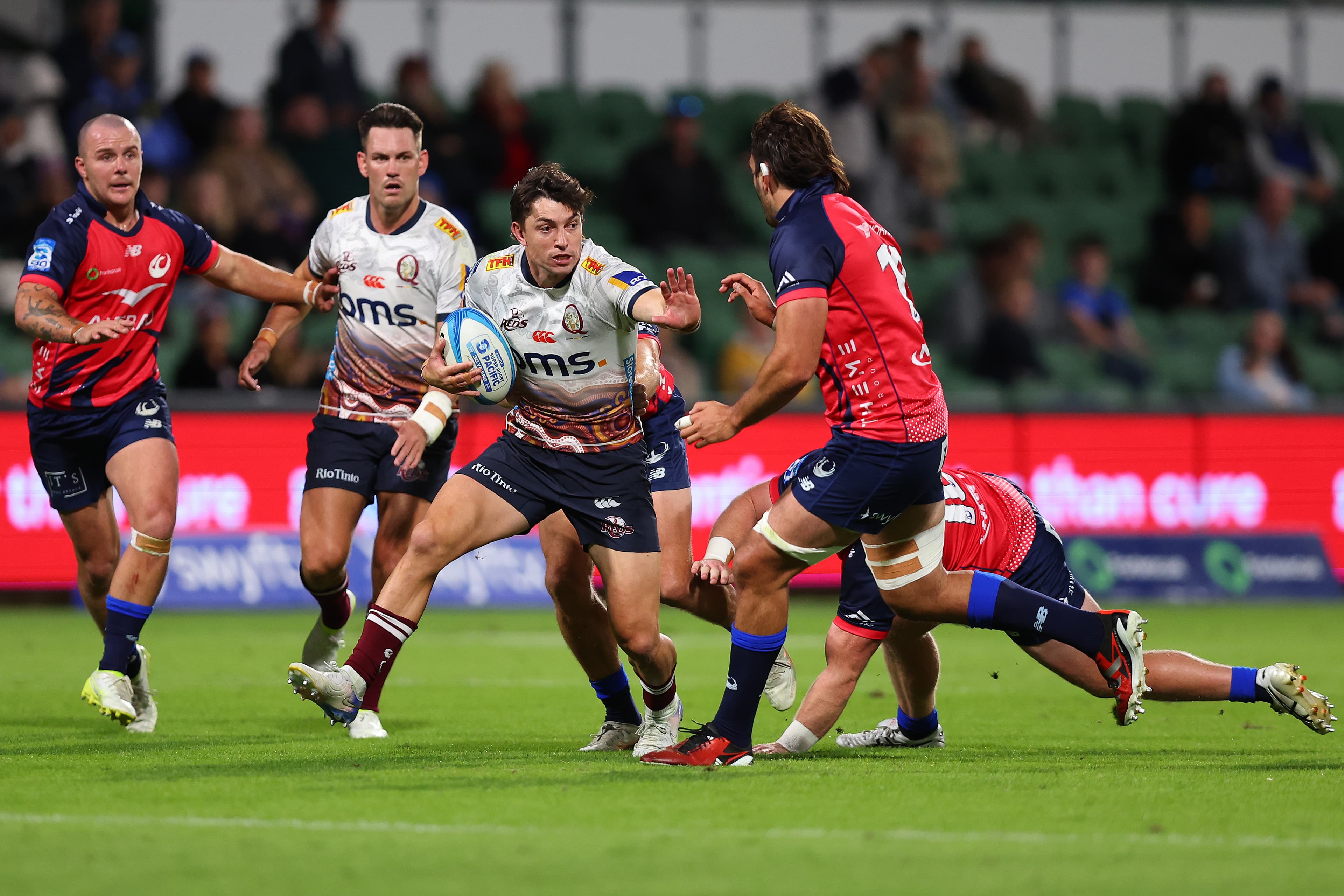 Standout Jock Campbell on the charge for the Reds against the Western Force in Perth. Photo: Paul Kane, Getty Images