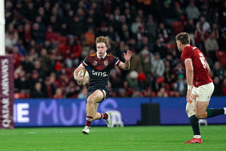 Reds winger Tim Ryan on the fly against the British and Irish Lions