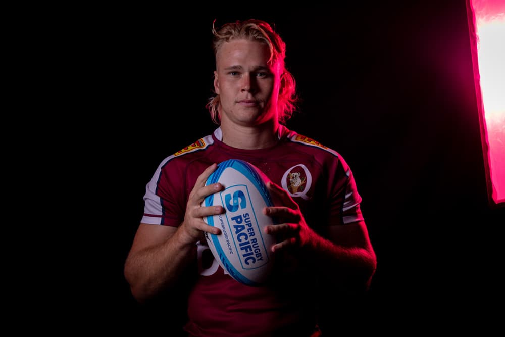 Louis Werchon passes the ball at Queensland training. Image: Reds Media Unit