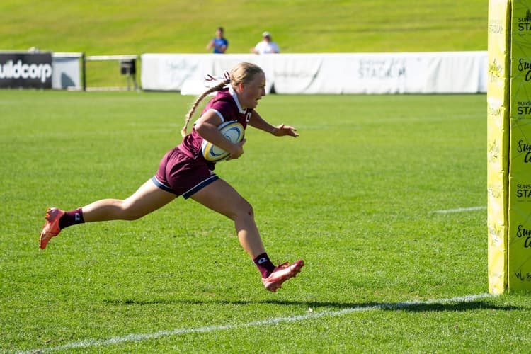 Try-time...sevens starlet Mia Byrnes scores the matchwinner for the Queensland U18s at the ASJRU Championships