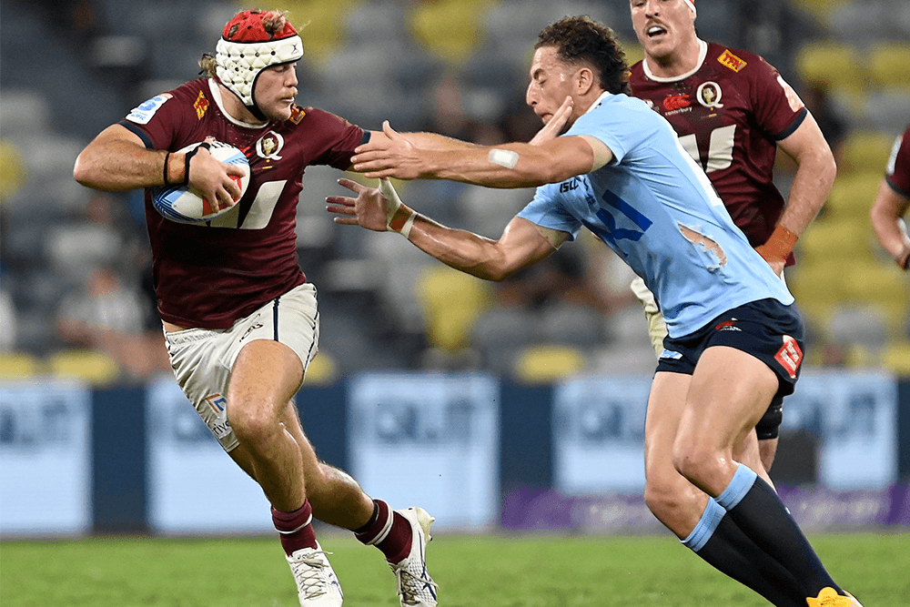 Fraser McReight fends in Townsville. Photo: Getty Images.