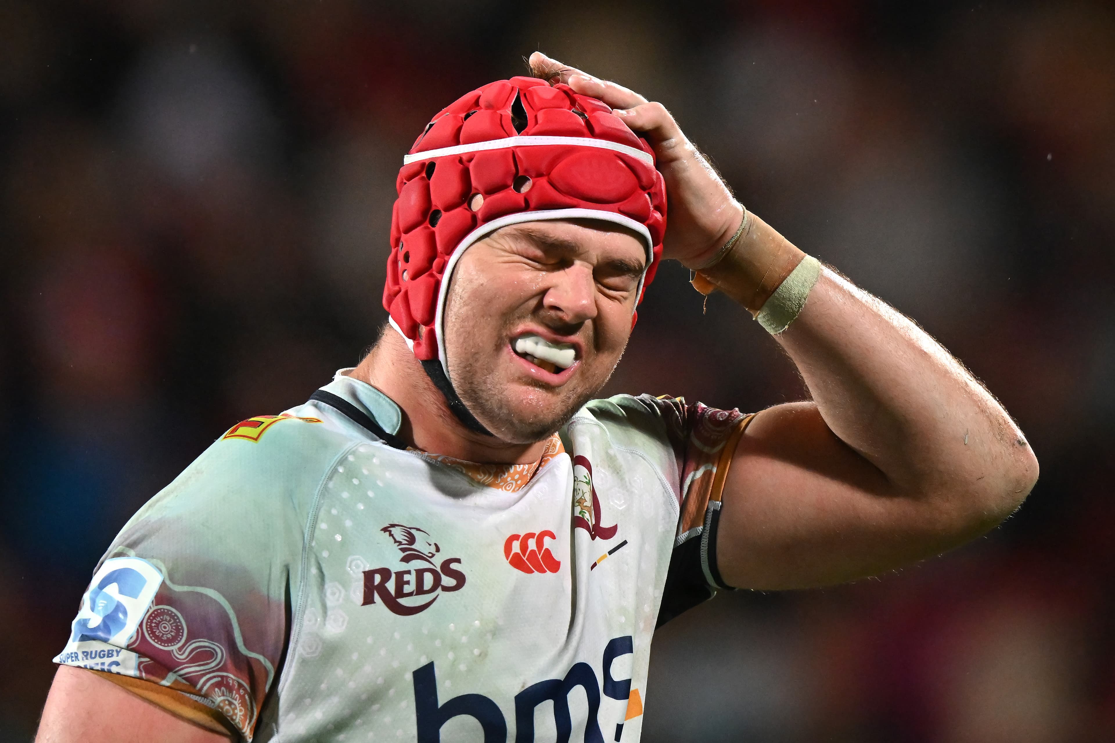 Reds forward Harry Wilson gave his all on a tough night in Christchurch. Photo: Kai Schwoerer, Getty Images