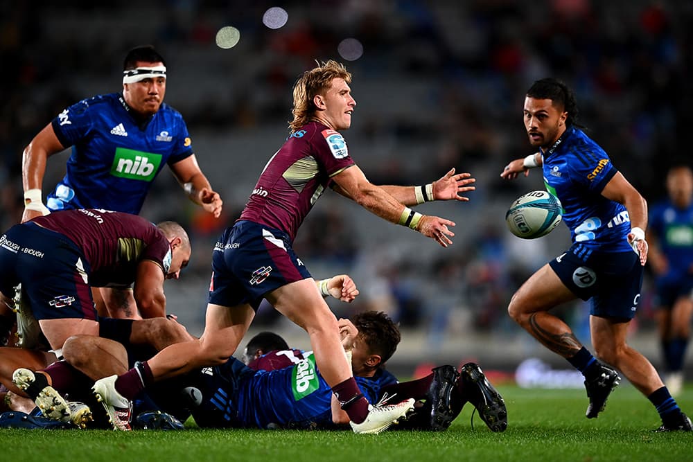 Tate McDermott gets a pass away against the Blues. Photo: Getty Images