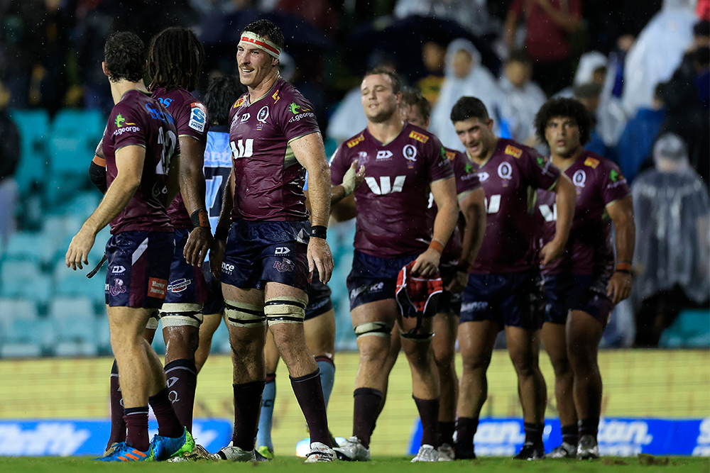 Ryan Smith scored his maiden Super Rugby try in Queensland's rain-soaked win over the Waratahs. Photo: Getty Images.