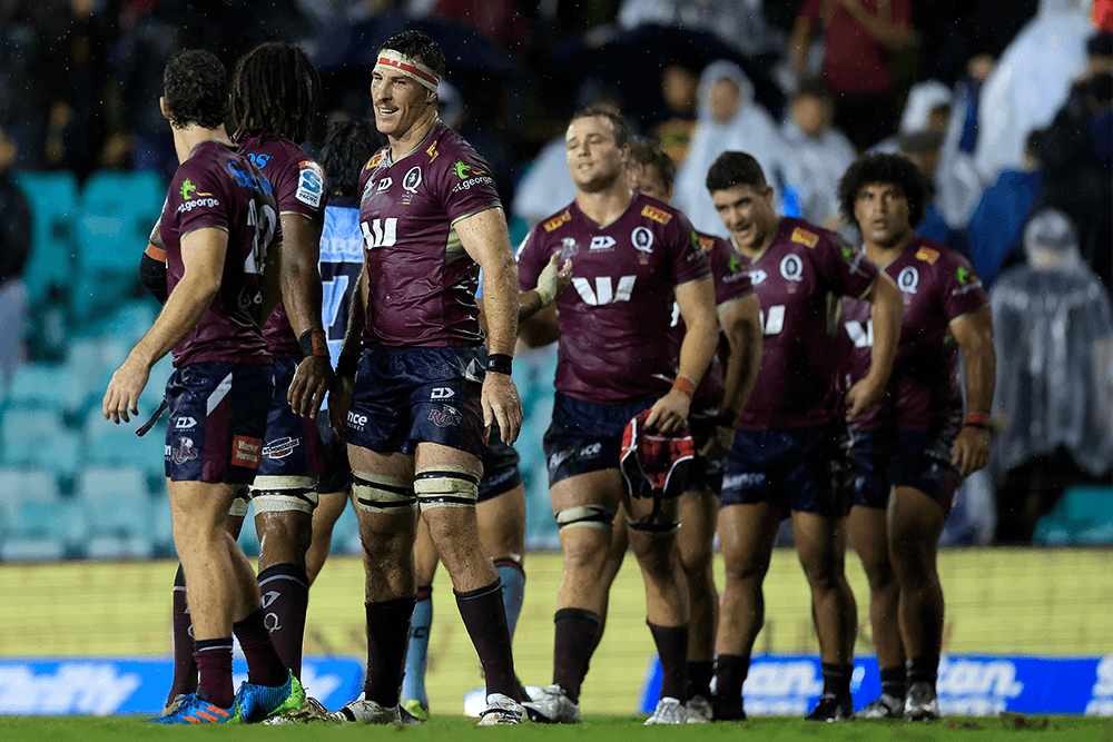 Ryan Smith scored his maiden Super Rugby try in Queensland's rain-soaked win over the Waratahs. Photo: Getty Images.