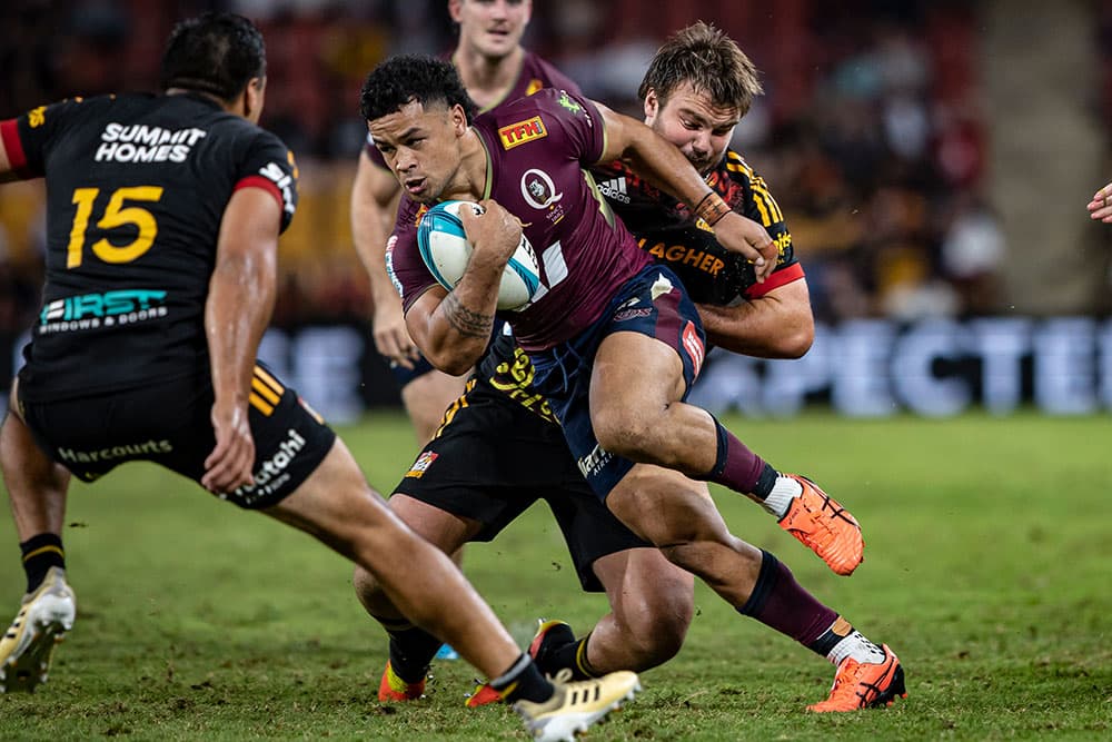 Hunter Paisami carrying strongly against the Chiefs at Suncorp Stadium. Photo: QRU/Brendan Hertel