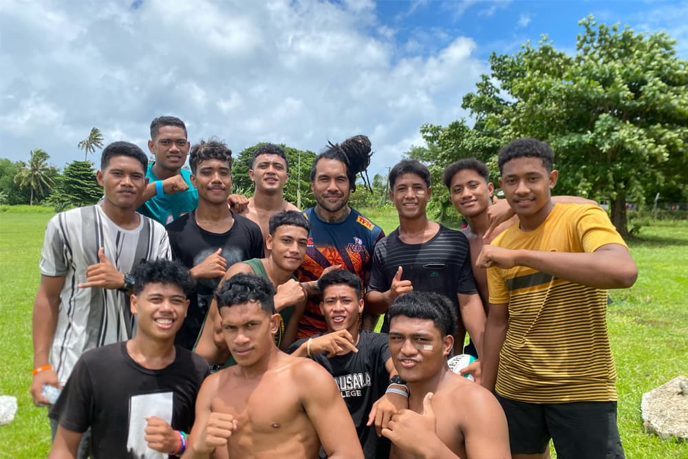 Digby Ioane (centre back) hosting a sports clinic in Samoa today, February 5.