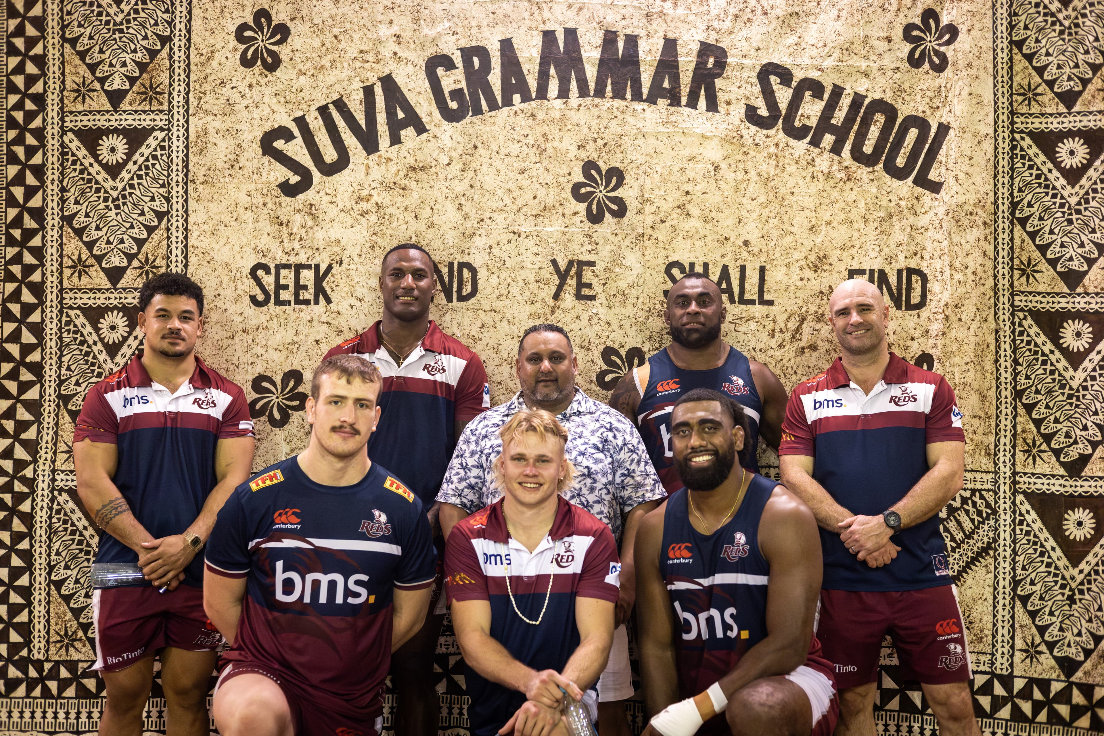 Niltech Consulting Chief Executive Nilesh Singh visited Suva Grammar with Reds (from left) Hunter Paisami, Cormac Daly, Suliasi Vunivalu, Louis Werchon, Peni Ravai and Seru Uru plus Sam Cordingley, QRU General Manager, Professional Rugby.