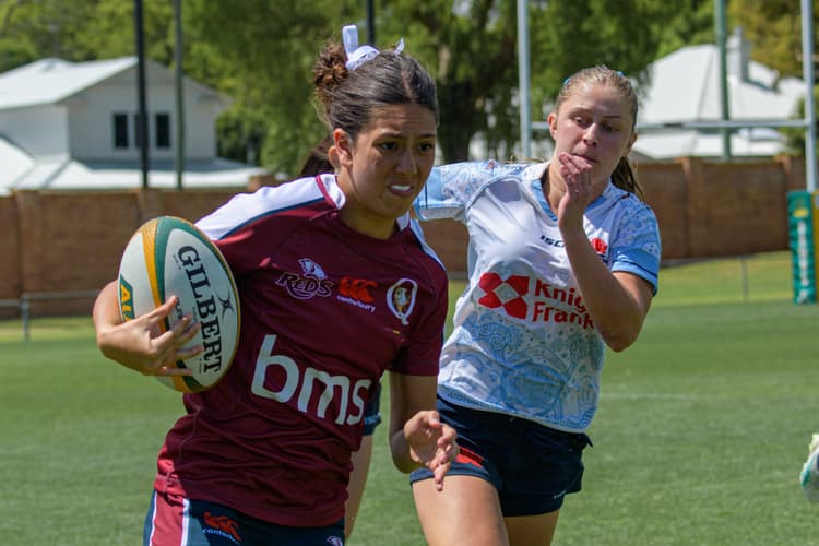 Rhani Hagan dashes into a gap for Queensland in the Next Gen 7s