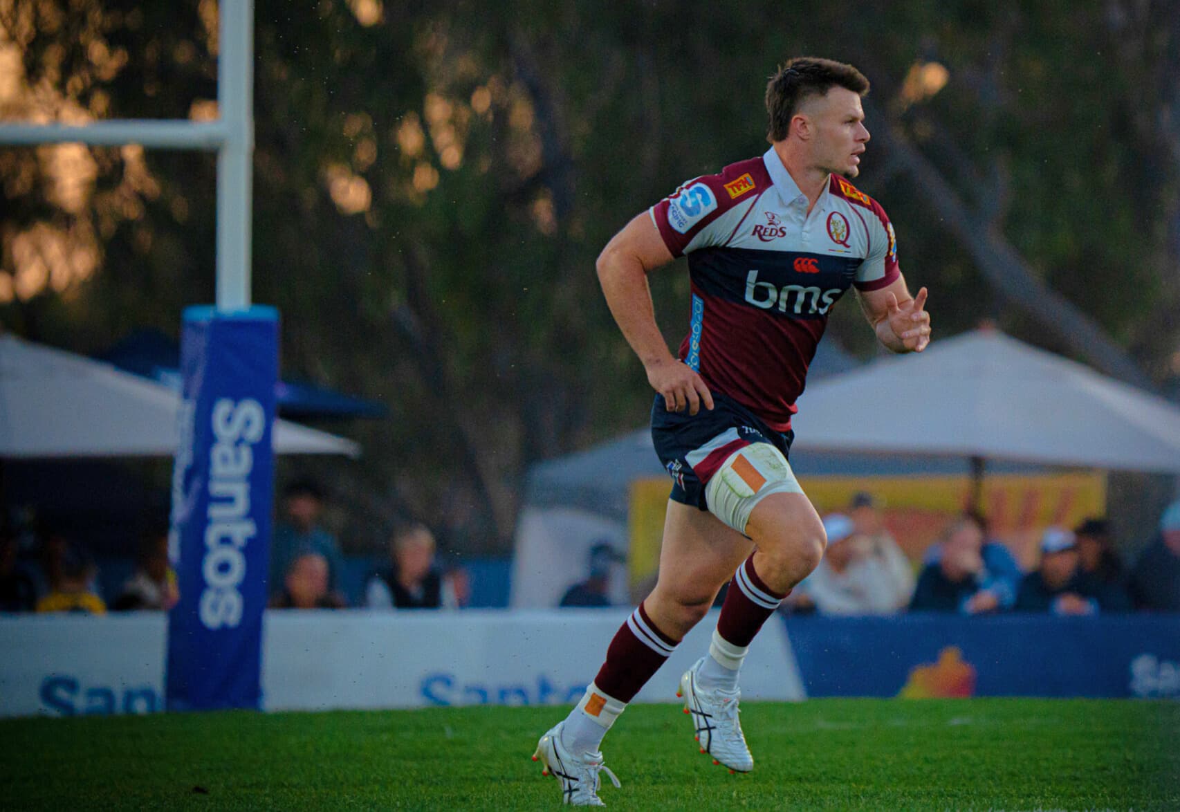 Reds centre Isaac Henry in action against the NSW Waratahs at the Santos Festival of Rugby.