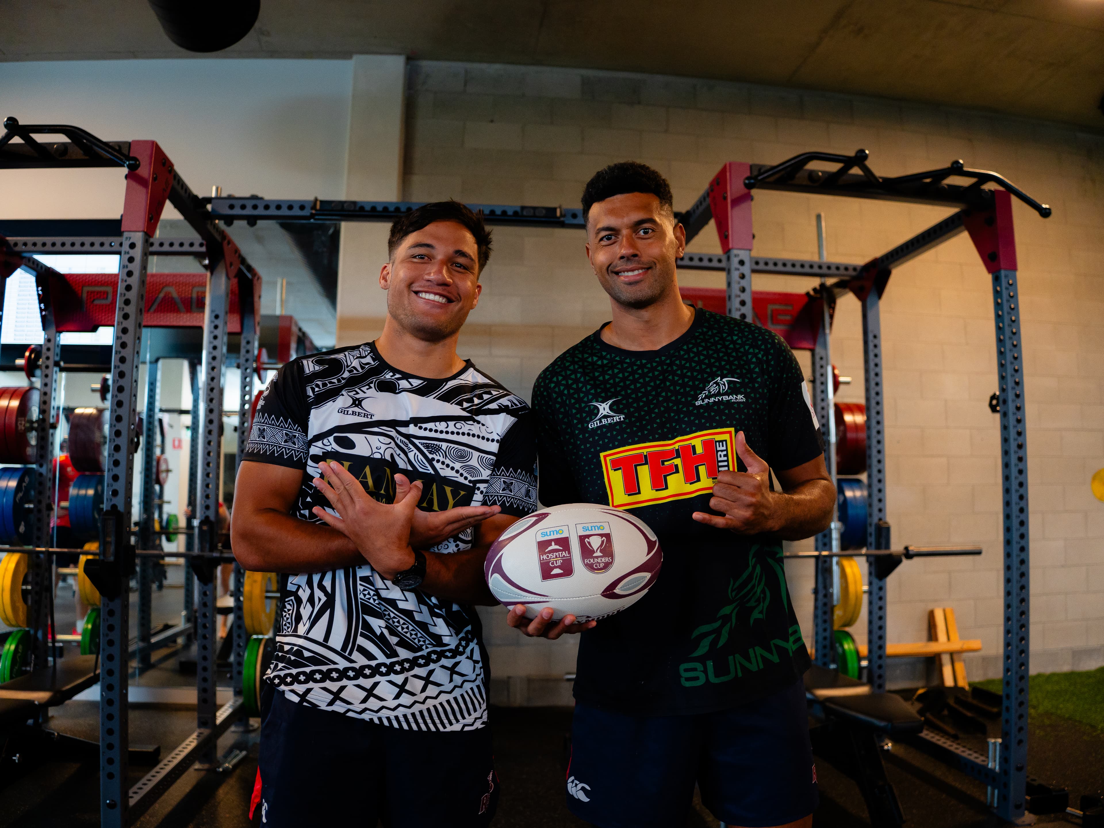 Reds Kalani Thomas (left) and Ben Volavola salute their club connections with Souths and Sunnybank