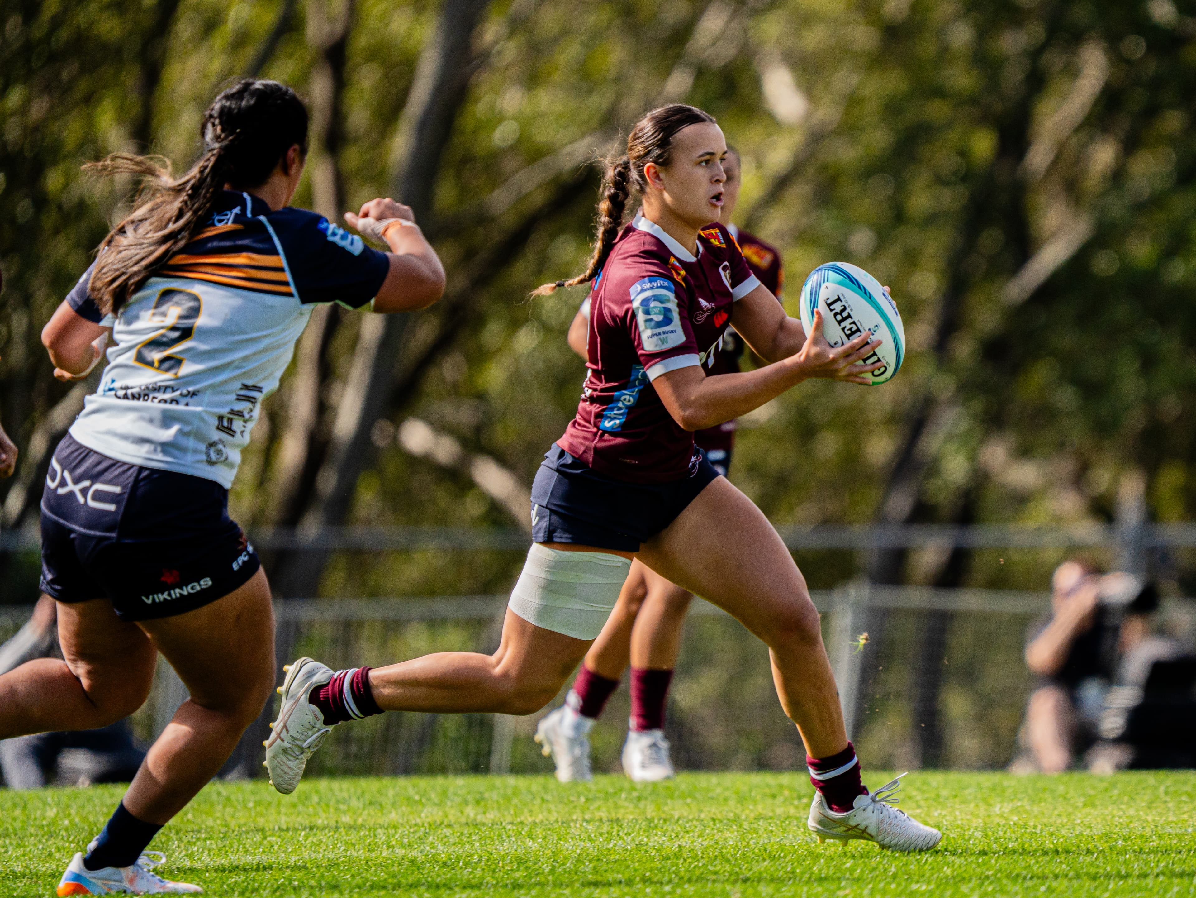 Impressive Reds centre Ava Wereta on the chrage against the Brumbies at Ballymore