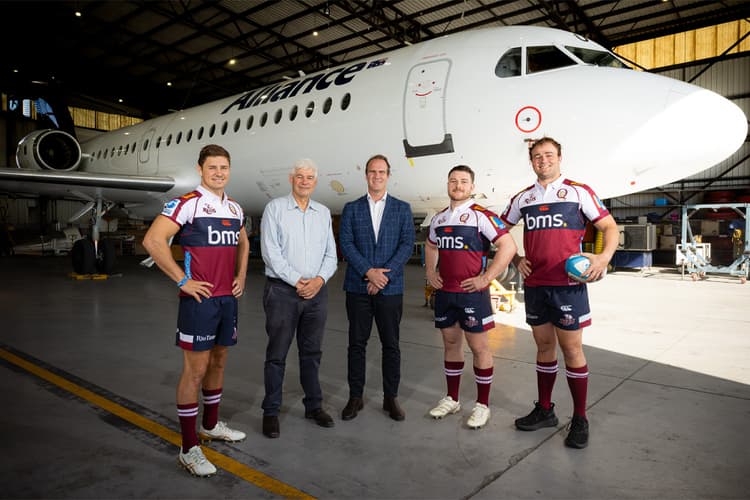 Queensland Reds players (from left) Josh Flook, Matt Faessler and Harry Wilson join Alliance Airlines Managing Director Scott McMillan and Queensland Rugby Union Chief Executive David Hanham to announce the three-year extension with the air charter partner.