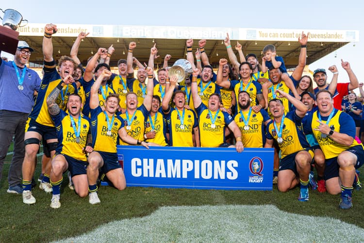 The jubilant Bond University side after their grand final triumph at Ballymore
