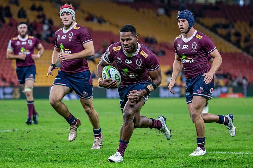 Reds winger Filipo Daugunu scores his third try in as many games. Photo: Brendan Hertel/QRU