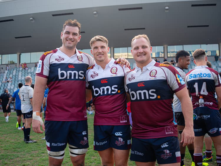 Reds debutants (from left) Jack Brady and Graham Urquhart savour their first game with Theo Fourie at Ballymore