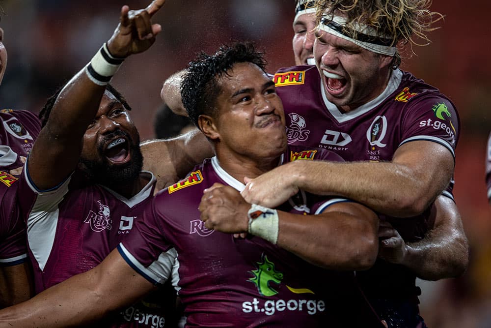Alex Mafi celebrates after scoring a double at Suncorp Stadium. Photo: Brendan Hertel/QRU