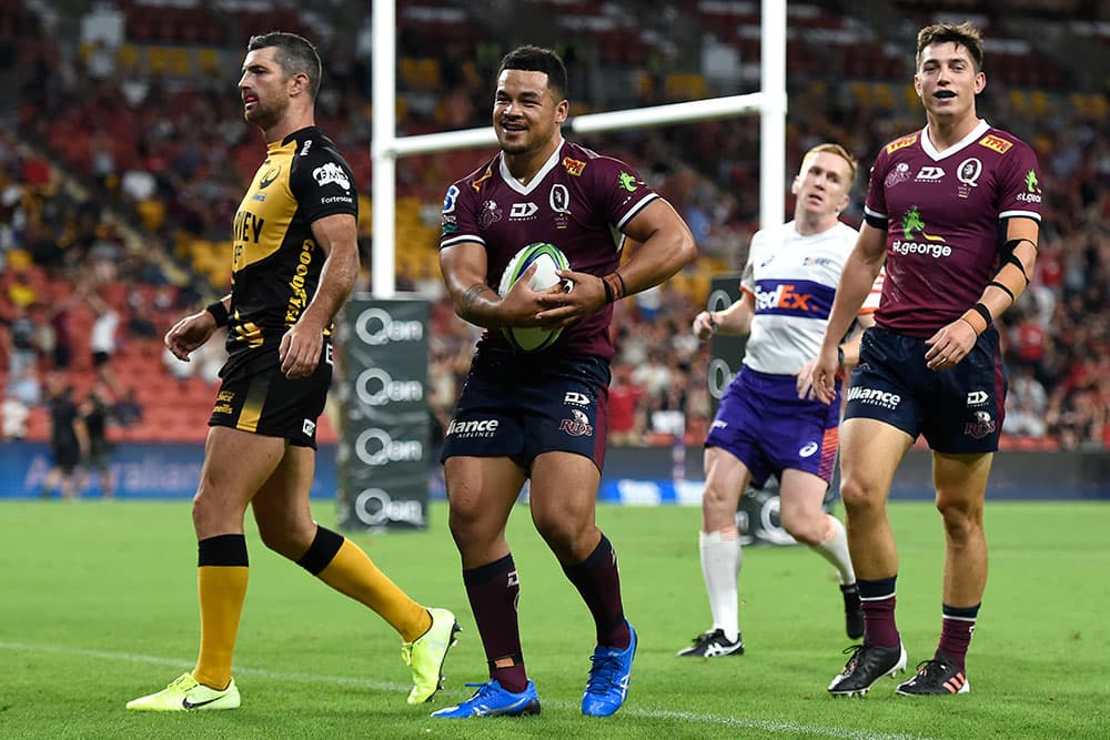 Hunter Paisami celebrates after scoring at Suncorp Stadium. Photo: Getty Images