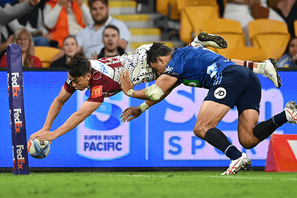 Jock Campbell flies to score against the Blues. Photo: Getty Images.