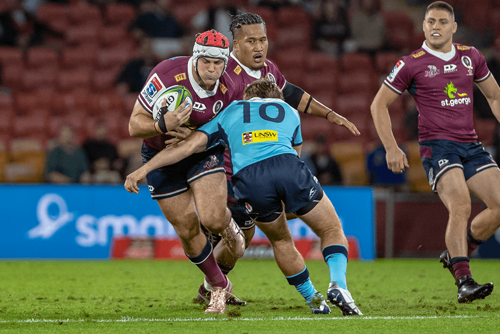 Fraser McReight hitting up the ball against the Waratahs. Photo: QRU/Brendan Hertel
