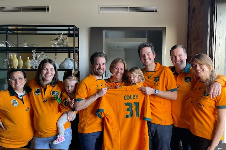 Andrew Cole’s wife Anne-Maree, with ‘Coley’ jersey, surrounded by family on the way to honour him at the Wallabies’ Test. Photo supplied